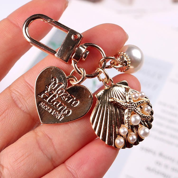 Golden Charm Pearl KeyChain