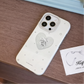 Phone case with heart design on a wooden surface